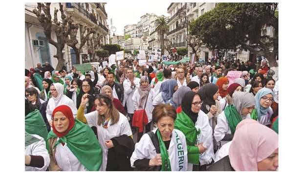 Algerian healthcare professionals take part in a demonstration in the capital Algiers against President Abdelaziz Bouteflika, yesterday.