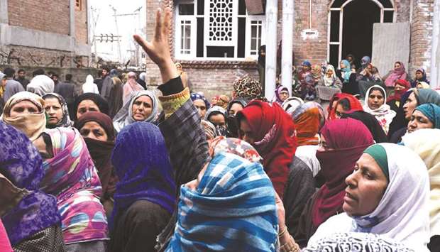 Villagers shout anti-Indian slogans following the death of school teacher Rizwan Asad Pandit allegedly in police custody in Awantipora of Pulwama district, south of Srinagar yesterday.