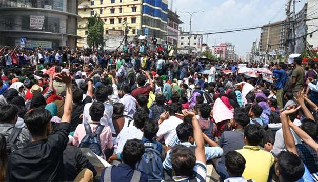 Bangladeshi students block a road during a protest in Dhaka