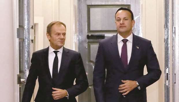 Irish Prime Minister Leo Varadkar walks with president of the European Council Donald Tusk (left) inside the government buildings in Dublin yesterday.