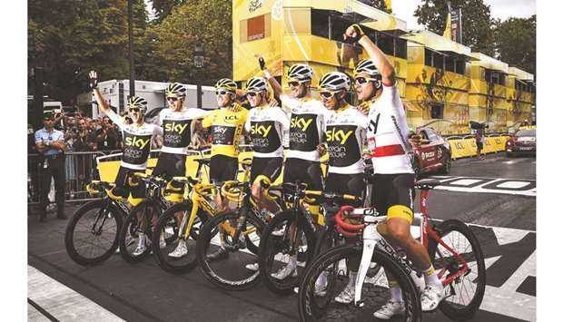 In this July 29, 2018, picture, Team Sky riders pose after the last stage of the Tour de France. (AFP)