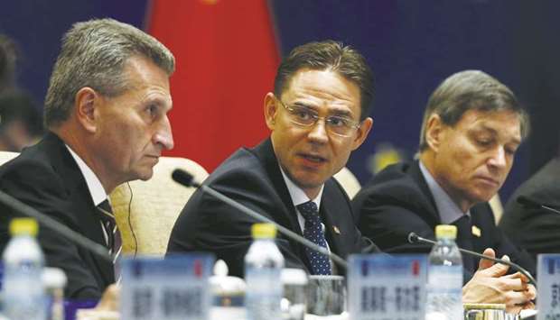 European Commission vice president Jyrki Katainen (centre) speaks during the fifth China-EU high level economic and trade dialogue at Diaoyutai State Guesthouse in Beijing (file). EU leaders will debate relations with China over dinner at a summit today.