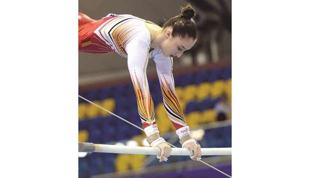 Nina Derwael of Belgium performs on the Uneven Bars during the Artistic Gymnastics Individual Apparatus World Cup at Aspire Dome yesterday. PICTURES: Thajudeen