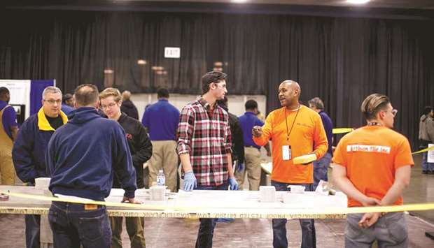 Job seekers at a career expo in Detroit. The number of Americans filing applications for unemployment benefits fell more than expected last week, pointing to still strong labour market conditions, though the pace of job growth has slowed after last yearu2019s robust gains.