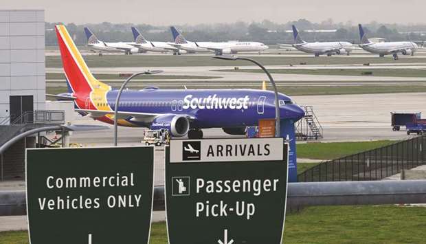 A Southwest Airlines Boeing 737 MAX 8 aircraft is pictured in front of United Airlines planes, including Boeing 737 MAX 9 models, at William P Hobby Airport in Houston, Texas, US, on March 18.