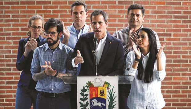Venezuelan opposition leader Juan Guaido attends a news conference in Caracas, Venezuela, yesterday.