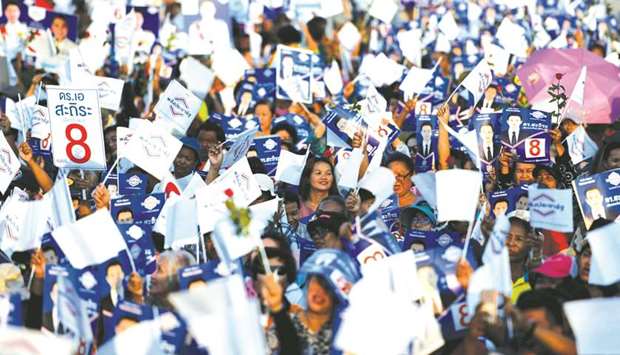 Supporters of the Phalang Pracharat party attend a campaign rally in Chonburi province, three days before the countryu2019s general election.
