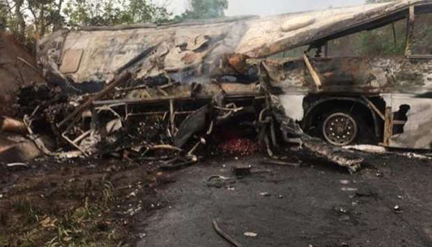 The burned remains of one of the crashed buses.  Photo: Onua FM/ Twitter
