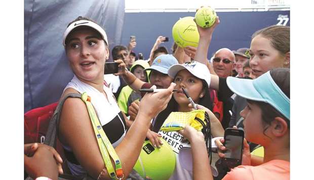 Bianca Andreescu of Canada is mobbed by fans after her three-set win over Irina-Camelia Begu of Romania during the fourth day of the Miami Open in Miami Gardens, Florida. (AFP)