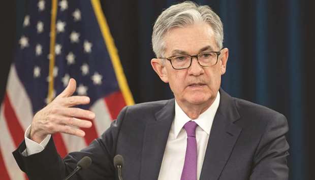 Powell: No rate increases this year amid risks to outlook.