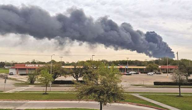 Smoke rises from the Intercontinental Terminals Company plant in the suburb of Deer Park in Houston in this March 18, 2019, file photo.