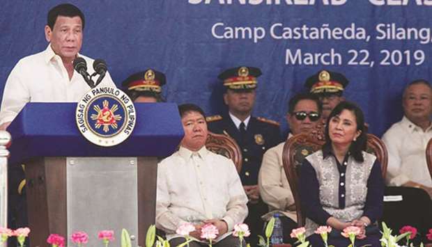 President Rodrigo Duterte delivers a speech during the 40th Commencement Exercise of Philippine National Police Academy in Camp Castaneda in Silang, Cavite. Also in picture is Vice President Maria Leonor u201cLeniu201d Robredo (third from left).
