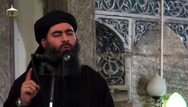 In this file photo taken on July 05, 2014 from a propaganda video released by al-Furqan Media allegedly shows the leader of the Islamic State (IS) group, Abu Bakr al-Baghdadi, aka Caliph Ibrahim, adressing worshippers at a mosque in the militant-held northern Iraqi city of Mosul