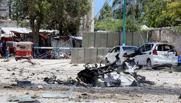 A general view shows the scene of a suicide explosion after al-Shabaab militia stormed a government building in Mogadishu, Somalia