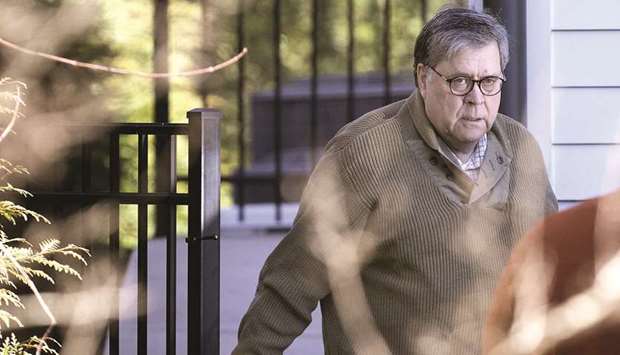 Attorney General William Barr departs his home in McLean, Virginia, yesterday morning.