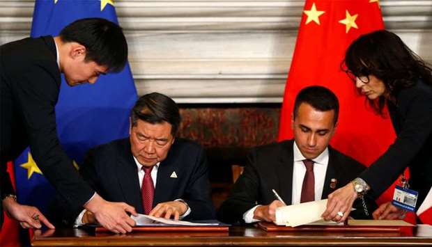 He Lifeng, Chairman of China's National Development and Reform Commission (NDRC) and Italian Minister of Labor and Industry Luigi Di Maio sign trade agreements at Villa Madama in Rome, Italy