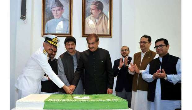 A cake-cutting ceremony at the Pakistan embassy to mark the National Day.rnrn