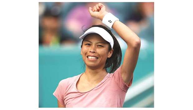Su-Wei Hsieh of Taipei (left) celebrates defeating Naomi Osaka (right) of Japan during their Miami Open match in Miami Gardens, Florida. (Getty Images/AFP)