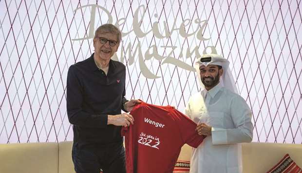 Supreme Committee for Delivery and Legacy Secretary-General Hassan al-Thawadi (right) with former Arsenal manager Arsene Wenger.