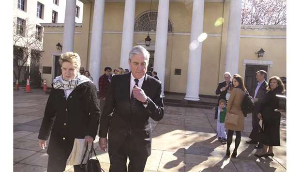 Special counsel Robert Mueller walks with his wife Ann Mueller in Washington, DC, yesterday.