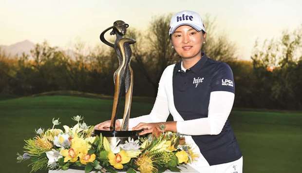 Ko Jin-Young of South Korea poses with the trophy after winning the Bank Of Hope Founders Cup in Phoenix, Arizona, on Sunday. (AFP)