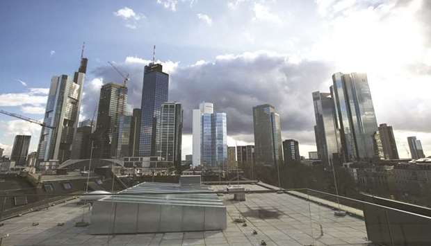 Skyscrapers are seen on the financial centre u2018Mainhattanu2019 skyline in Frankfurt. The growth outlook for Germanyu2019s export-reliant economy has been clouded by trade disputes triggered by US President Donald Trumpu2019s u2018America Firstu2019 policies and the risk of Britain crashing out of the European Union without an agreement.