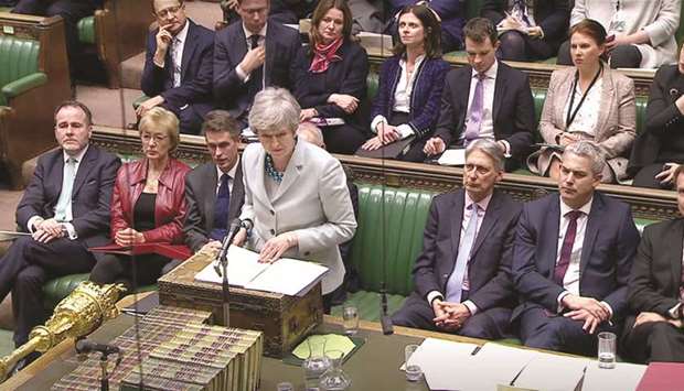 Prime Minister Theresa May delivers a statement in the Parliament in London yesterday.