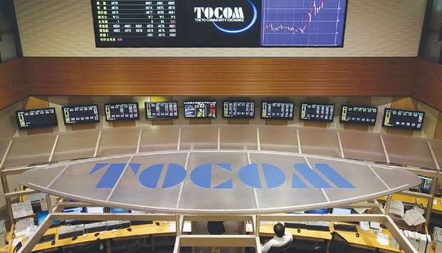 The Tokyo Commodity Exchange logo is displayed on the Tocom trading floor in Tokyo. Tocomu2019s merger with JPX could prove to be a fillip for the commodities bourse as it opens the market to a bigger pool of liquidity.