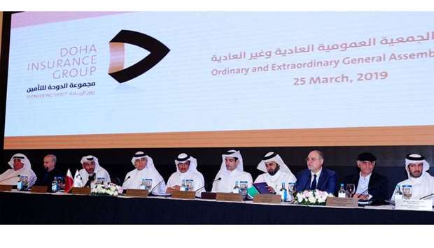 Doha Insurance Group chairman Sheikh Nawaf bin Nasser bin Khaled al-Thani and other directors and top executives at the company's ordinary and extraordinary general assemnly meetings at the La Cigale on Monday. Picture: Ram Chand