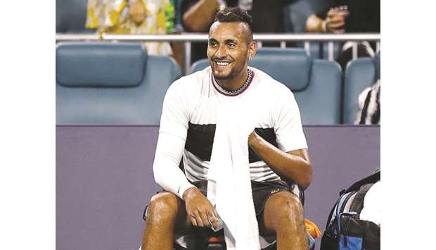 Australiau2019s Nick Kyrgios laughs during his match against Serbiau2019s Dusan Lajovic (not pictured) in Miami, Florida, on Monday. (AFP)