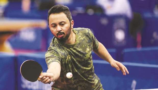 Qatar's Ahmed Khalil El Mouhanadi and Aia Mohamed (right) in action during the qualification matches of the 2019 ITTF World Tour Platinum Qatar Open at the Ali Bin Hamad Al Attiyah Arena.