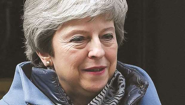 Britainu2019s Prime Minister Theresa May leaves from 10 Downing Street yesterday. Britainu2019s parliament began plotting a new Brexit strategy after seizing the initiative in the floundering process from Prime Minister Theresa Mayu2019s government in a historic vote.