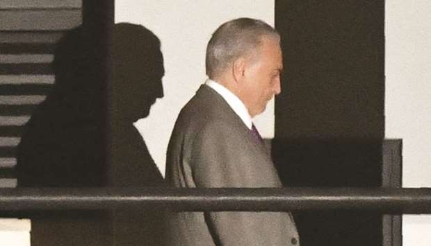 Ex-president Michel Temer leaves the Federal Police headquarters in Rio de Janeiro, Brazil, yesterday.