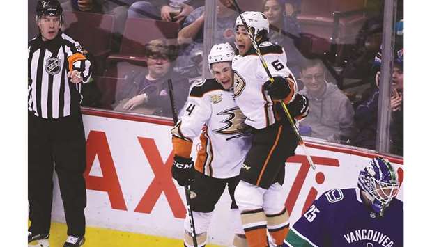 Anaheim Ducks forward Sam Steel (left) celebrates with forward Kiefer Sherwood after scoring a goal against the Vancouver Canucks during their NHL match at the Rogers Arena. PICTURE: USA TODAY Sports