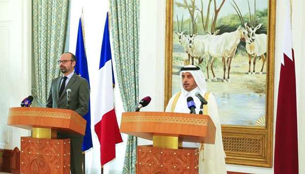 HE the Prime Minister and Interior Minister Sheikh Abdullah bin Nasser bin Khalifa al-Thani speaks at the press conference as his French counterpart Edouard Philippe looks on at the Amiri Diwan.