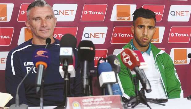 Raja Casablanca coach Patrice Carteron (left) addresses a pre-match press conference yesterday.