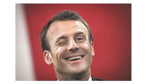 French President Emmanuel Macron blinks an eye during a debate with children in Beaupreau-en-Mauges, western France.