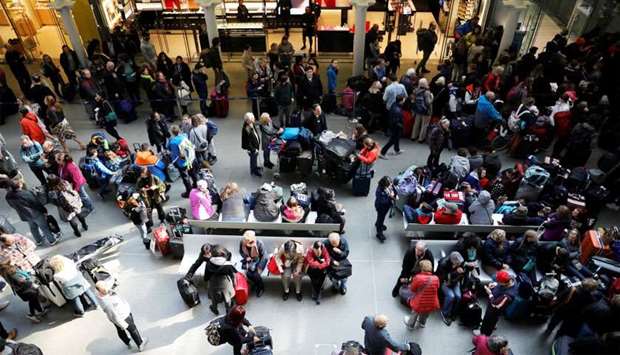 People wait due to Eurostar delays at St Pancras Railway Station in London, Britain