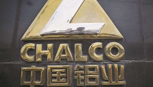 A signage for Aluminium Corporation of China is displayed at the companyu2019s smelting facility in Zibo, China. The company said in a presentation to analysts that its aluminium production came in at 4.17mn tonnes last year.