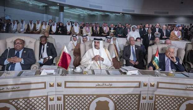 His Highness the Amir Sheikh Tamim bin Hamad Al-Thani attends the opening session of the Arab League summit