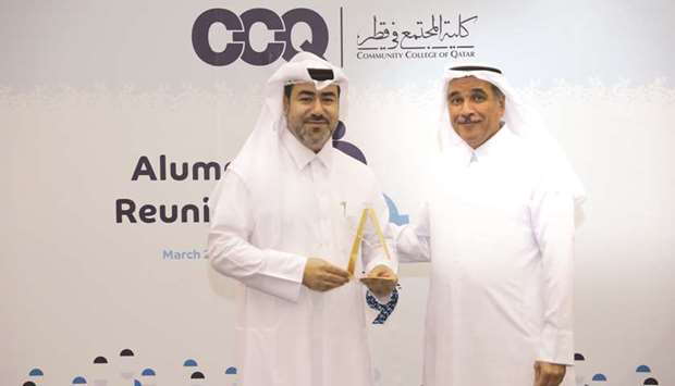 CCQ president Dr Mohamed al-Naemi with Alumnus Award Winner Ali al-Kaabi.