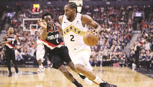 Toronto Raptors forward Kawhi Leonard drives to the basket past Portland Trail Blazers forward Al-Farouq Aminuin the first quarter at Scotiabank Arena. PICTURE: USA TODAY Sports