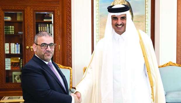 His Highness the Amir Sheikh Tamim bin Hamad al-Thani met the Chairman of the High Council of Libya, Khaled Ammar al-Mishri, and his accompanying delegation at the Amiri Diwan on Monday. During the meeting, they reviewed the bilateral relations and ways to support and promote them, in addition to developments in Libya. The Chairman of the High Council of State of Libya briefed the Amir on the latest developments, thanking him for the Qatar's support for the Libyan government and people. The Amir affirmed Qatar's firm stance in supporting the unity and stability of Libya.