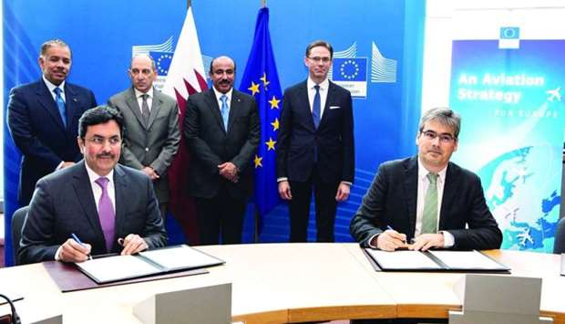HE al-Subaey and Carlos Acosta signing the agreement as HE al-Sulaiti, HE al-Baker and al-Khulaifi look on.