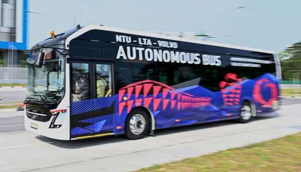 A Volvo AB 7300 electric autonomous bus drives on the track of Centre of Excellence for Testing & Research of Autonomous Vehicles after being unveiled in Singapore