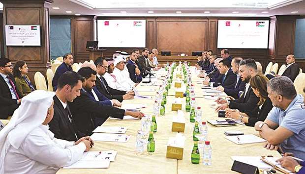 Qatar Chamber officials during their meeting with the trade delegation from Jordan.