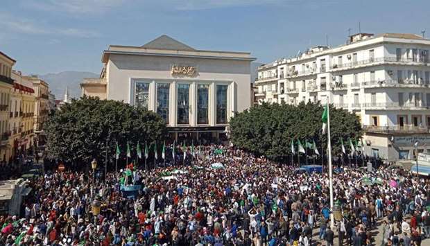 Algerians participate in a protest rally against their ailing president's bid for a fifth term in power, in the northeastern city of Annaba