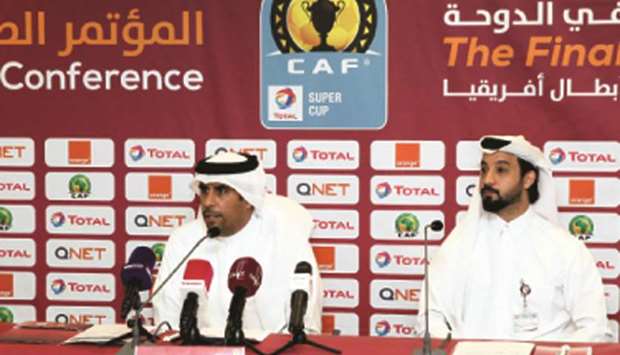 QFAu2019s marketing and communications director Khalid al-Kuwari (L) and QFA media  manager Ali Salat announcing the details of the CAF Super Cup match yesterday.