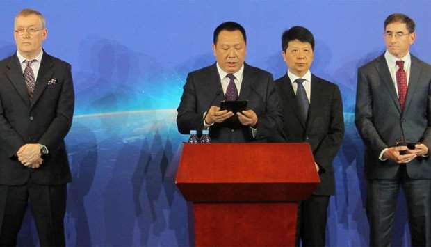 Huawei's chief legal officer Song Liuping speaks next to senior vice president and global cyber security and privacy officer John Suffolk (left) and rotating chairman Guo Ping (2nd from right) at a news conference in Shenzhen
