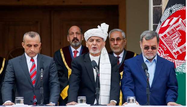 Afghanistan's President Ashraf Ghani, his first Vice President Amrullah Saleh (L) and second Vice President Sarwar Danish (R) taken an oath during their inauguration, in Kabul, Afghanistan on March 9.